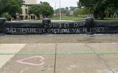 "Death to Zionism" was written in Yiddish on the CMU Fence. (Photo provided by Julie Paris)