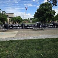 The Fence at CMU was painted with anti-Israel messages earlier this month. (Photo by David Rullo)