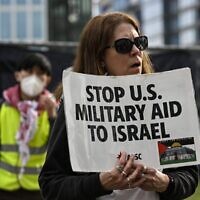 Protesters demonstrate outside the headquarters of AIPAC, the American Israel Public Affairs Committee in Washington, D.C., March 13, 2024. (Celal Gunes/Anadolu via Getty Images)