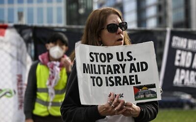 Protesters demonstrate outside the headquarters of AIPAC, the American Israel Public Affairs Committee in Washington, D.C., March 13, 2024. (Celal Gunes/Anadolu via Getty Images)