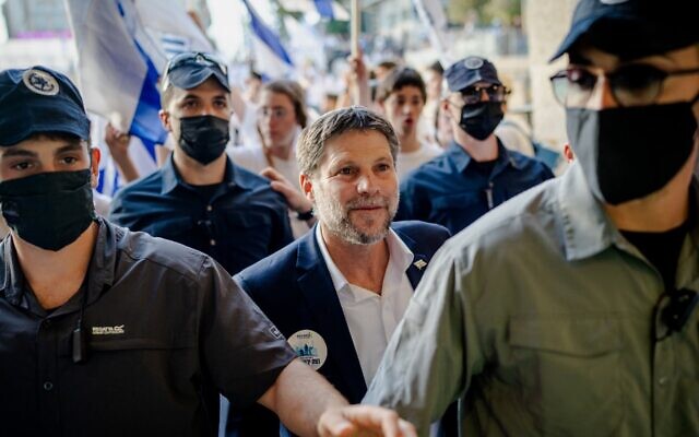 Israel's Finance Minister Bezalel Smotrich takes part in the Jerusalem Day parade at the Damascus Gate in the old city of Jerusalem, May 14, 2026. The controversial annual march sees thousands of nationalist Israelis celebrate the capture of the formerly Jordanian-held east of the city during the Six-Day War in 1967. (Erik Marmor/Getty Images)