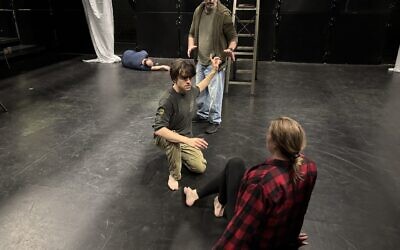 David Nackman (top) and Joanna Lowe (bottom) rehearse with Ayden Freed for the upcoming production of "Hamlet: The Bad Quarto." (Photo by Jeremy Segher) 