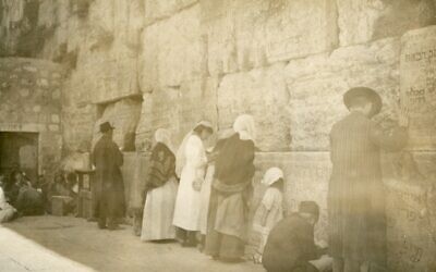 Abraham Orkin Freedman's photograph of the Western Wall from 1921 showed men and women praying together at the Jewish holy site. (Courtesy Tower of David Jerusalem Museum)