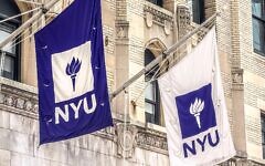 Two NYU flags flying above entrance to Frederick Loewe Theatre on New York University campus. (Plexi Images/GHI/UCG/Universal Images Group via Getty Images)