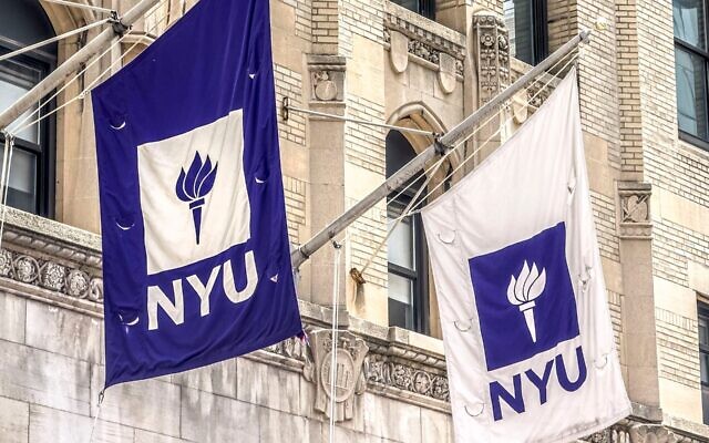 Two NYU flags flying above entrance to Frederick Loewe Theatre on New York University campus. (Plexi Images/GHI/UCG/Universal Images Group via Getty Images)