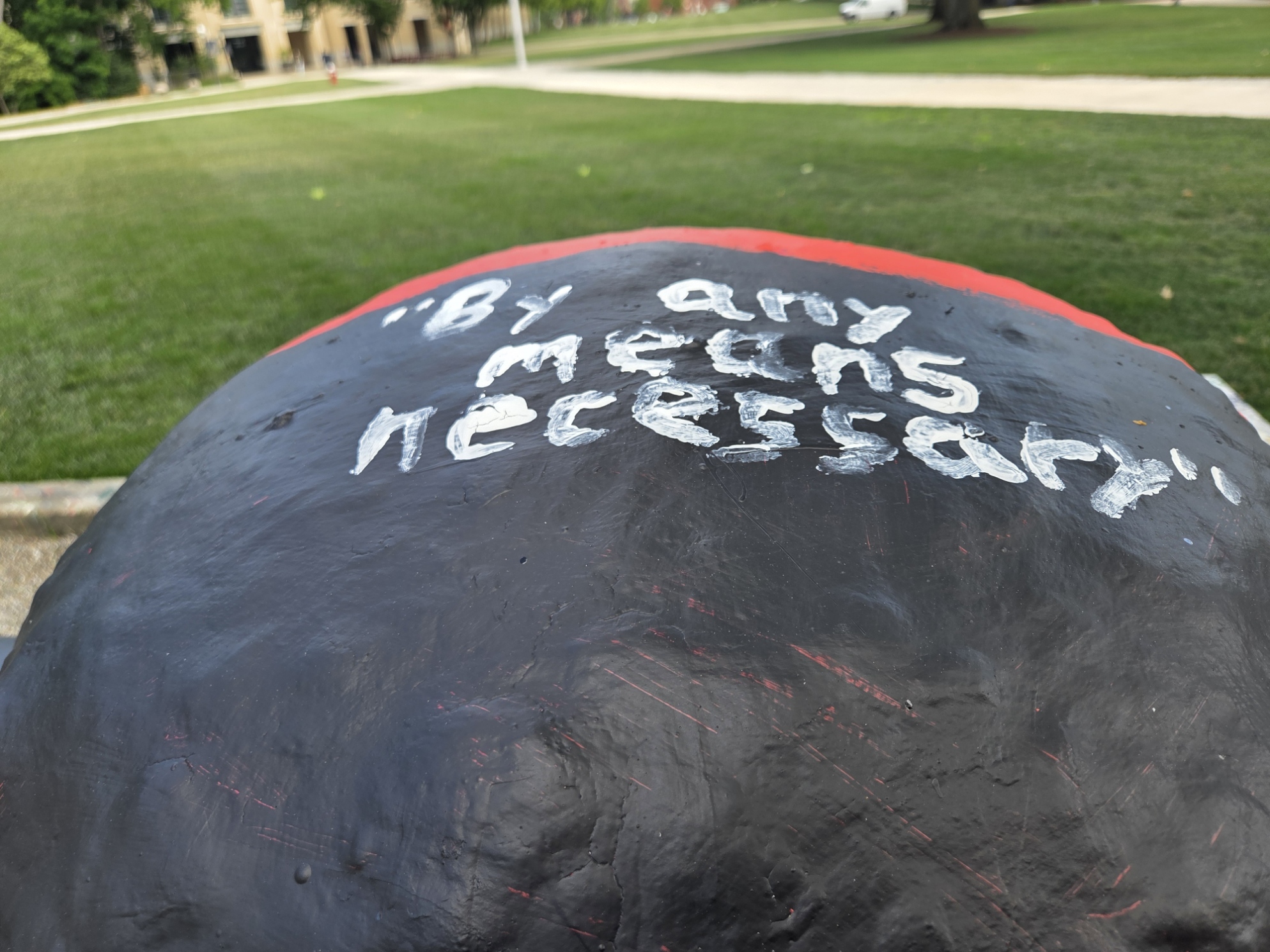 CMU investigating 8 students for messages painted on the Fence