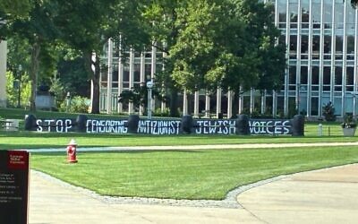 The latest antizionist post was painted on the CMU fence June 30, the fourth in less than a month. (Photo by Zev Adelson)