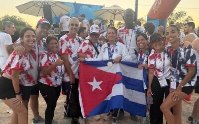 Hella Eskenazi (C) poses with the Cuban delegation for the Maccabiah Games in Israel. (Courtesy Hella Eskenazi)