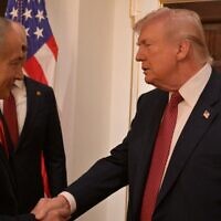 President Donald Trump (R) meets with the Israeli Prime Minister Benjamin Netanyahu (L) at the White House on Feb. 11, 2026, in Washington D.C. (Avi Ohayon - GPO/Anadolu via Getty Images)