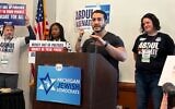 Michigan Democratic U.S. Senate candidate Abdul El-Sayed addresses the state's Jewish Democratic Caucus during the party's nominating convention in Lansing, Mich., Aug. 29, 2026. During the meeting, El-Sayed apologized for earlier comments he had made about an attack on a synagogue in the state, in which he had said, "Hurt people hurt people." (Andrew Lapin/JTA)