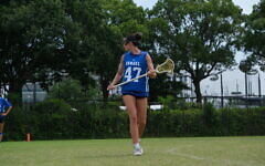Reagan Surloff represents Israel Lacrosse while competing in Tokyo. (Photo courtesy of Reagan Surloff)