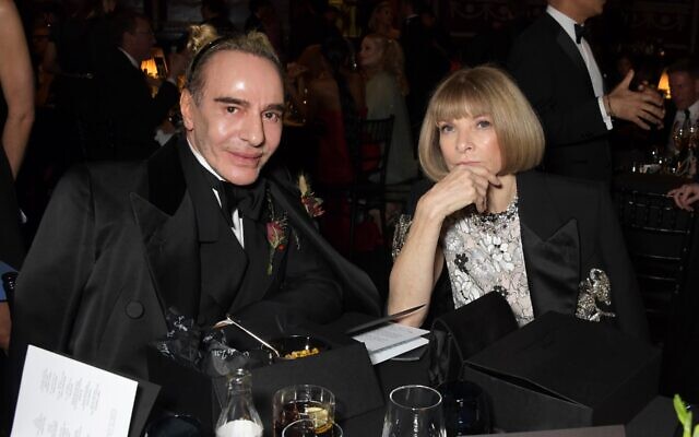 Designer John Galliano and then Vogue editor in chief Anna Wintour attend the Fashion Awards 2021 at Royal Albert Hall, London, Nov. 29, 2021. (David M. Benett/Getty Images)