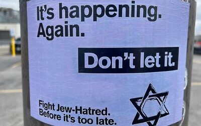 A poster against antisemitism is seen on the International Day for the Elimination of Racial Discrimination in Markham, Ontario, Canada on March 22, 2025. (Creative Touch Imaging Ltd./NurPhoto)