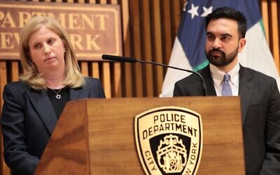 NYPD Commissioner Jessica Tisch speaks as New York Mayor Zohran Mamdani listens during a press conference in New York City on April 2, 2026. (Michael M. Santiago/Getty Images)