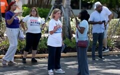 Rep. Debbie Wasserman Schultz (D-FL) speaks with voter Sandra Woodburn as she campaigns outside of the Kings Point Clubhouse polling station on August 18, 2026, in Tamarac, Florida. (Joe Raedle/Getty Images)