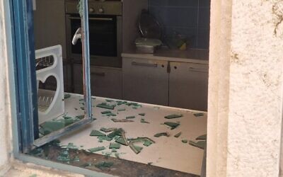 A damaged window at Kol HaNeshamah synagogue in Jerusalem. (Courtesy of Debi Shoua Haim)