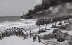 The Irgun ship Altalena burning off the Tel Aviv beach after being shelled by the IDF on June 22, 1948. (Photo by Hans Pinn via Wikimedia)