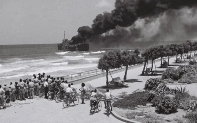 The Irgun ship Altalena burning off the Tel Aviv beach after being shelled by the IDF on June 22, 1948. (Photo by Hans Pinn via Wikimedia)