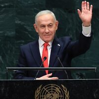 Israel's Prime Minister Benjamin Netanyahu waves at the United Nations General Assembly in New York on Sept. 24, 2026. (TIMOTHY A. CLARY / AFP)