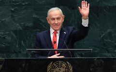 Israel's Prime Minister Benjamin Netanyahu waves at the United Nations General Assembly in New York on Sept. 24, 2026. (TIMOTHY A. CLARY / AFP)