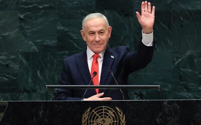Israel's Prime Minister Benjamin Netanyahu waves at the United Nations General Assembly in New York on Sept. 24, 2026. (TIMOTHY A. CLARY / AFP)