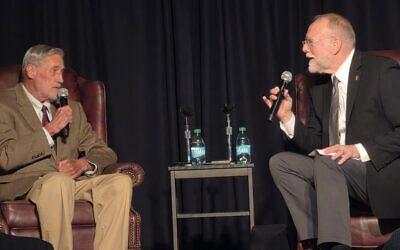 Author Maxwell King, left, and Heinz History Center CEO Andy Masich discuss painter Aaron Gorson. (Photo by Adam Reinherz)