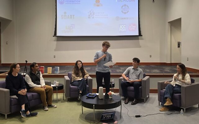 Chayim Massart introduces panelists during 'Let's Talk About It' on Sept. 23 at The Friendship Circle of Pittsburgh. (Photo by Adam Reinherz)