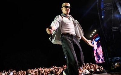 US rapper, singer, dancer and DJ, Benjamin Haggerty, known as Macklemore, performs at the Goldencoast Rap Festival in Corcelles-les-Monts, near Dijon, central-eastern France, on August 30, 2026. (Arnaud Finistre / AFP via Getty Images)