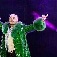 Rapper Benjamin Haggerty, known as Macklemore, performs at the Goldencoast Rap Festival in Corcelles-les-Monts, France, Aug. 30, 2026. (ARNAUD FINISTRE / AFP)