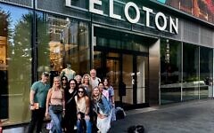 Julie Paris (back row, second from right) and a group of concerned Peloton users met with company representatives after one of its instructors created an Instagram post, labeling a map of  Israel as “Palestine.” Photo courtesy of Julie Paris