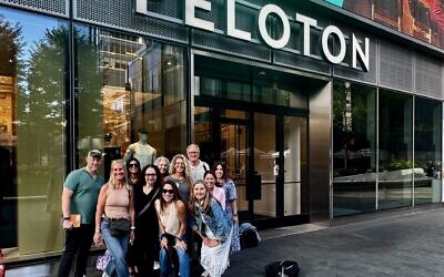 Julie Paris (back row, second from right) and a group of concerned Peloton users met with company representatives after one of its instructors created an Instagram post, labeling a map of  Israel as “Palestine.” Photo courtesy of Julie Paris