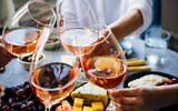 Glasses of rosé wine seen during a friendly party of a celebration. (Photo by  gregory_lee via iStock)