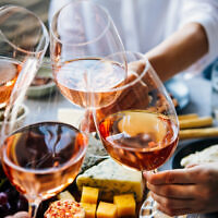 Glasses of rosé wine seen during a friendly party of a celebration. (Photo by  gregory_lee via iStock)