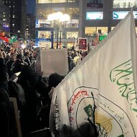 A protester holds a Pro-Palestinian protesters overwhelm the area of New York City's Union Square where an Israeli peace group planned to hold an Oct. 7 vigil on Oct. 7, 2026. (Joe Strauss/JTA)