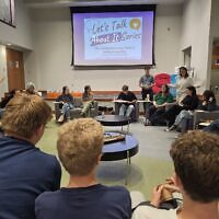 Teens, parents, medical professionals and staff of Friendship Circle of Pittsburgh participate in an Oct. 21 program. (Photo by Adam Reinherz)