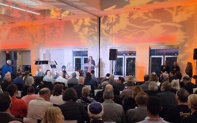 Maggie Feinstein, director of the 10.27 Healing Partnership, speaks during the Oct. 27 commemoration. (Photo by Adam Reinherz)