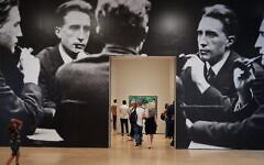 Visitors walk past an enlarged reproduction of 'Five-Way Portrait of Marcel Duchamp' on August 20, 2026 at the Museum of Modern Art in New York, NY. (Liao Pan/China News Service/VCG via Getty Images)