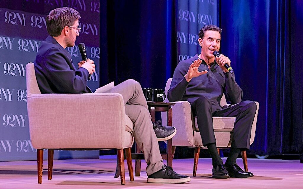 "Ali G: Who Iz I?” creator Sacha Baron Cohen, right, and podcast host Josh Horowitz discuss the actor's career at the 92nd Street Y in Manhattan, Oct. 22, 2026. (Josh Lobel/Michael Priest Photography)