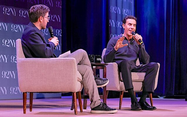 "Ali G: Who Iz I?” creator Sacha Baron Cohen, right, and podcast host Josh Horowitz discuss the actor's career at the 92nd Street Y in Manhattan, Oct. 22, 2026. (Josh Lobel/Michael Priest Photography)