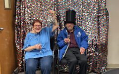 A New Year's party brings connections and laughter at the Jewish Community Center of Greater Pittsburgh's Memory Café. (Photo courtesy of Jewish Community Center of Greater Pittsburgh)