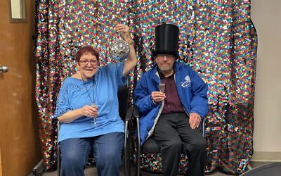 A New Year's party brings connections and laughter at the Jewish Community Center of Greater Pittsburgh's Memory Café. (Photo courtesy of Jewish Community Center of Greater Pittsburgh)