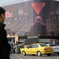 A giant anti-Israel and anti-Netanyahu billboard is displayed at Enghelab Square in Tehran as tensions between Iran and the United States and Israel continue, on October 12, 2026 in Tehran, Iran. The billboard depicts Israeli Prime Minister Benjamin Netanyahu addressing an empty hall and carries Persian messages reading, 'More isolated with each passing day' and 'Al-Aqsa Flood is a definite defeat for the Zionist regime.' (Fatemeh Bahrami/Anadolu via Getty Images)