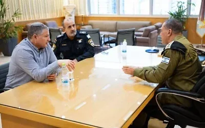 IDF Chief of Staff Lt. Gen. Eyal Zamir, Israel Police Commissioner Danny Levi, and Shin Bet chief David Zini meet at Zamir’s office in Tel Aviv, October 6, 2026. (Israel Defense Forces)