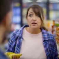 Actors playing a couple in a grocery store blame Israel for high prices in a campaign ad meant to support Michigan Democrat Abdul El-Sayed, paid for by the left-wing Rebellion PAC, Oct. 26, 2026. (Screenshot via X)