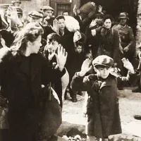 One of the most famous pictures of Jews being rounded up by Nazi Germans during the Holocaust, this from the Warsaw Ghetto Uprising in May 1943. (Credit: Wikimedia Commons)