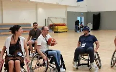Playing wheelchair basketball at ADI Negev-Nahalat Eran (Credit: Courtesy of Jewish National Fund-USA)