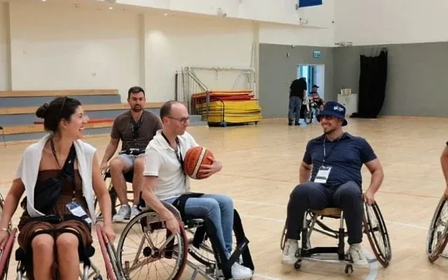 Playing wheelchair basketball at ADI Negev-Nahalat Eran (Credit: Courtesy of Jewish National Fund-USA)