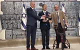 Israeli President Isaac Herzog presents the Presidential Medal of Honor to Israel Bonds Global President and CEO Dani Naveh and U.S. and International Chairman Andrew M. Hutter at the President’s Residence in Jerusalem, Oct. 12, 2026. (Photo by Sharon Altshul)