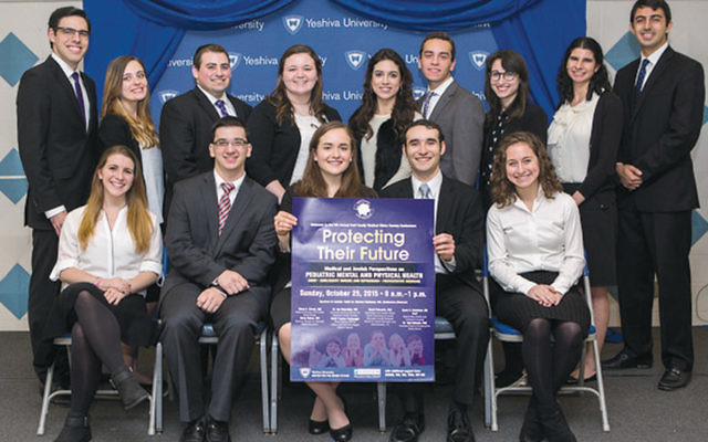 Esther Kazlow of Teaneck, an MES board member, is fifth from left, in the back row. (Courtesy YU)
