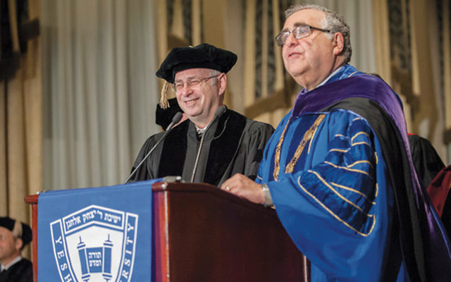 Dr. Ben Chouake received an honorary degree from YU President Richard M. Joel.